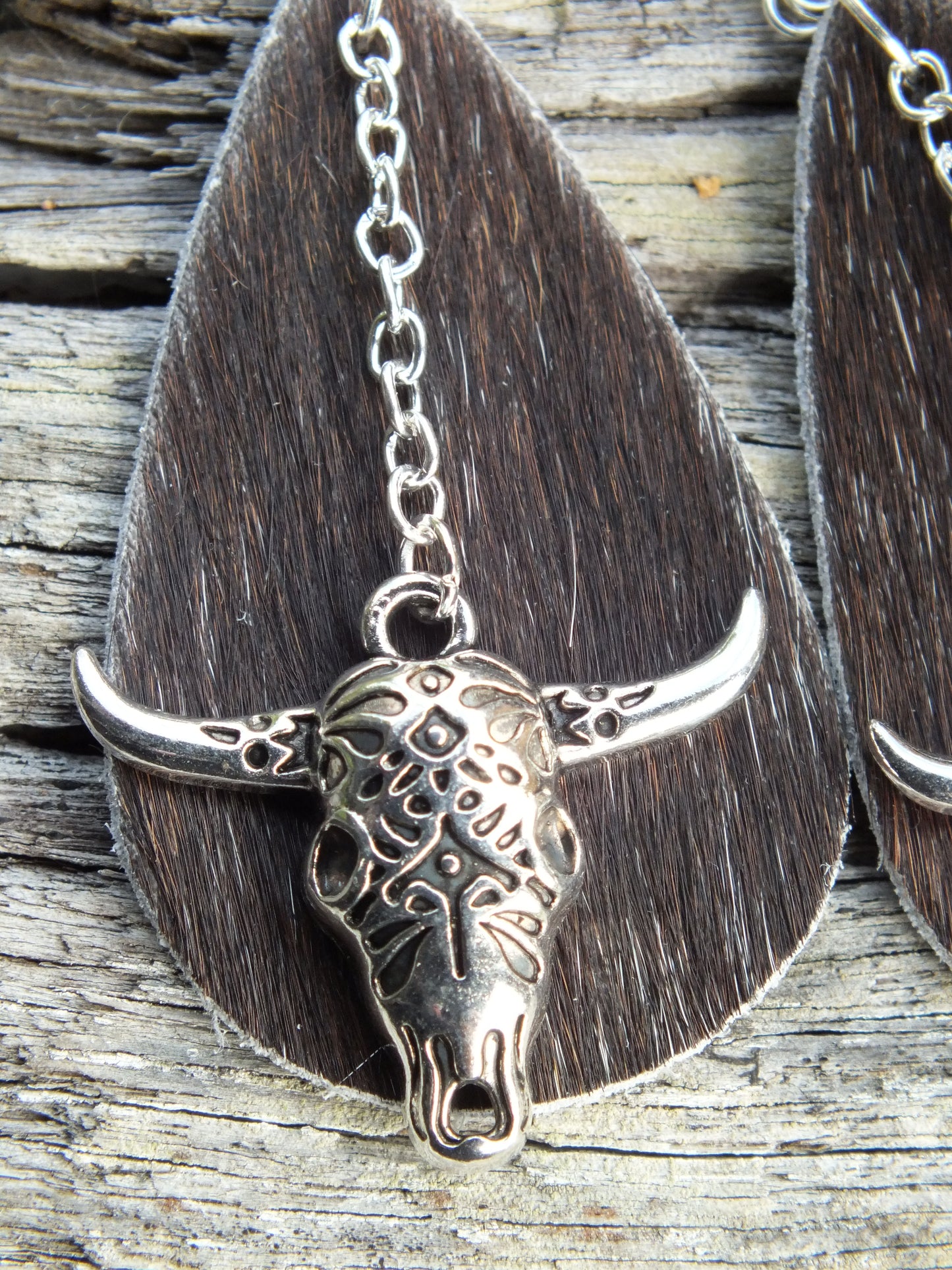Teardrop Cattle Hide Skull Earrings