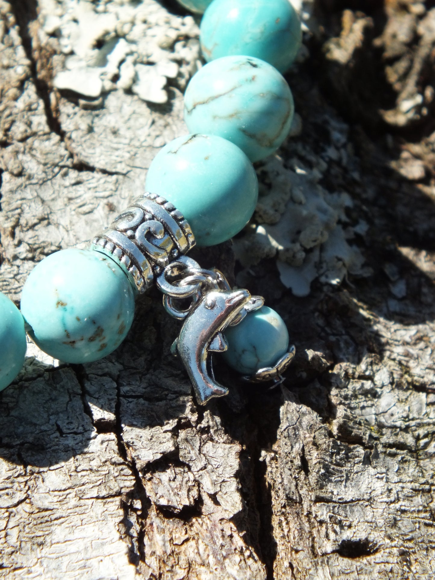 Turquoise Howlite Dolphin Charm Bracelet